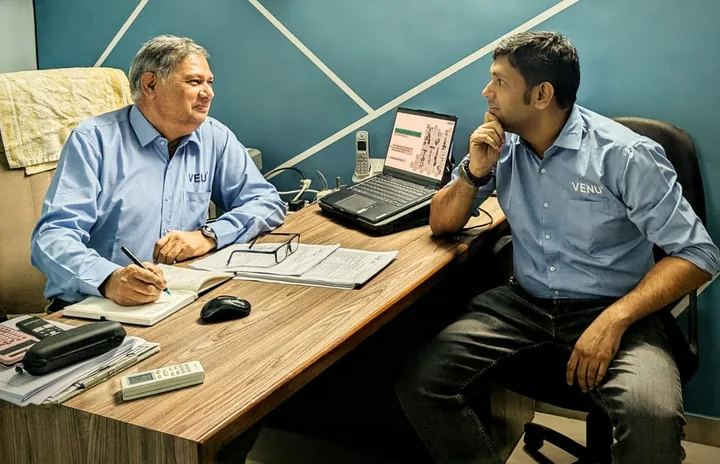 Anand S Mashruwala and Anay Mashruwala, third and fourth generations of the family, reviewing valve drawings at Venus Engineering Works