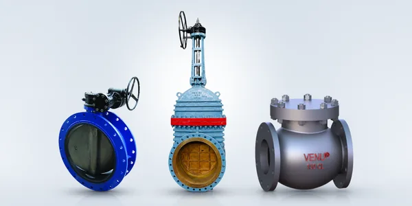 Three VENU valves on a light studio backdrop: a blue flanged butterfly valve with gearbox, a tall blue IBR steam gate valve with a red band, and a grey cast steel swing check valve marked VENU 150 CL.