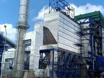 Boiler house and stack of a power plant with blue structural steel