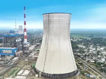 Natural-draught cooling tower beside a thermal power station